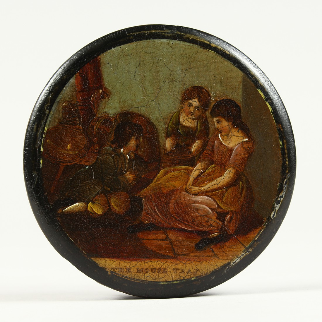 A VICTORIAN CIRCULAR PAPIER MACHE SNUFF BOX, the top with a scene "The Mouse Trap". 3.5ins