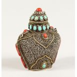 AN ISLAMIC FILIGREE SILVER SCENT BOTTLE with coral and turquoise stones. 2.5ins