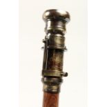 A WALKING STICK with compass and telescope