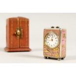 A SUPERB SMALL SILVER AND PINK ENAMEL CLOCK in a folding leather case. 1.5ins