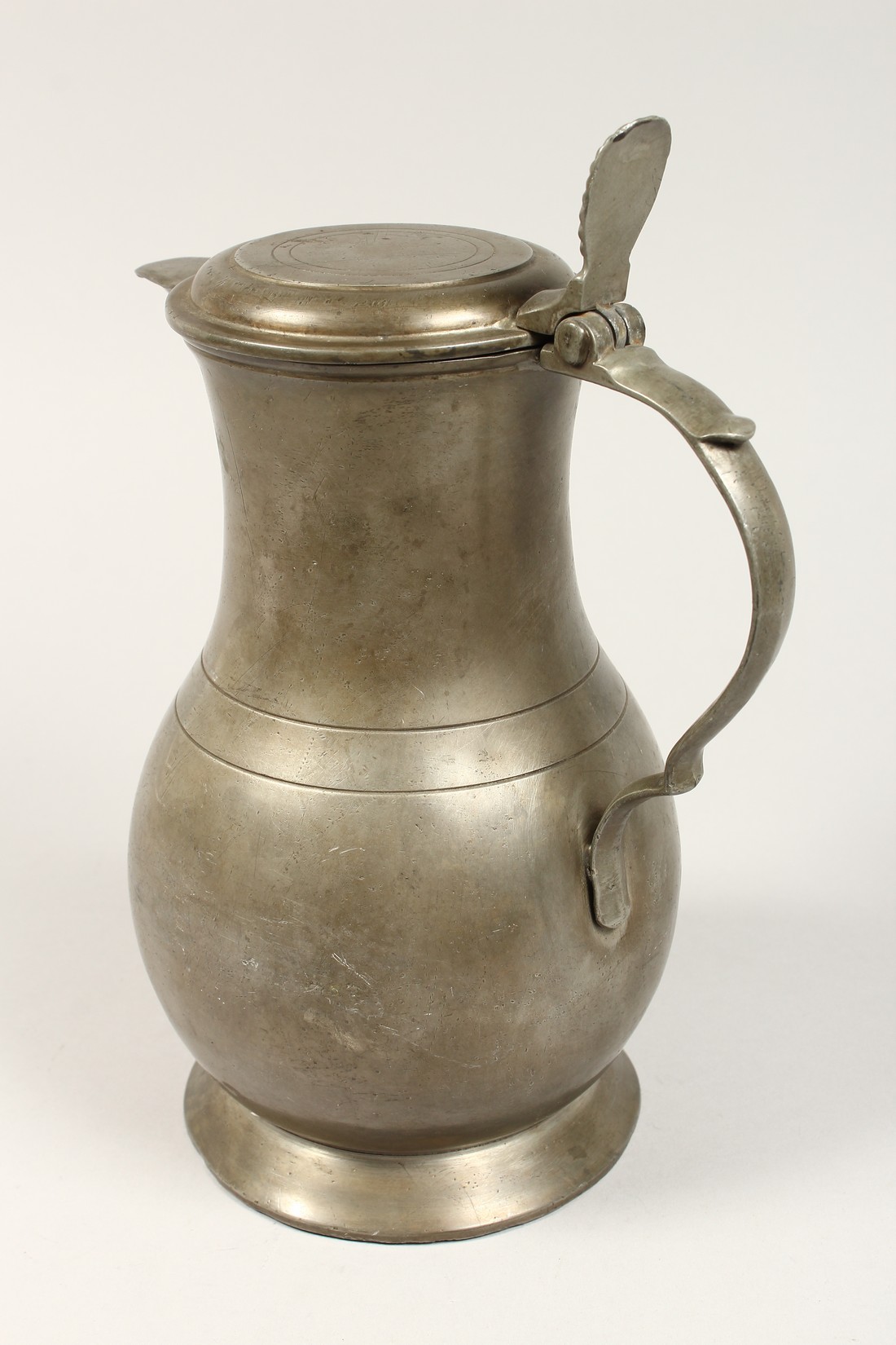 A FRENCH PEWTER LIDDED JUG 10ins high. - Image 2 of 4