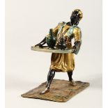 A PAINTED BRONZE OF AN ARAB carrying a tea tray. 4.5ins high.
