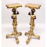 A GOOD PAIR OF EARLY 20TH CENTURY GILDED BLACKAMOOR STANDS with rectangular top, blackamoor supports