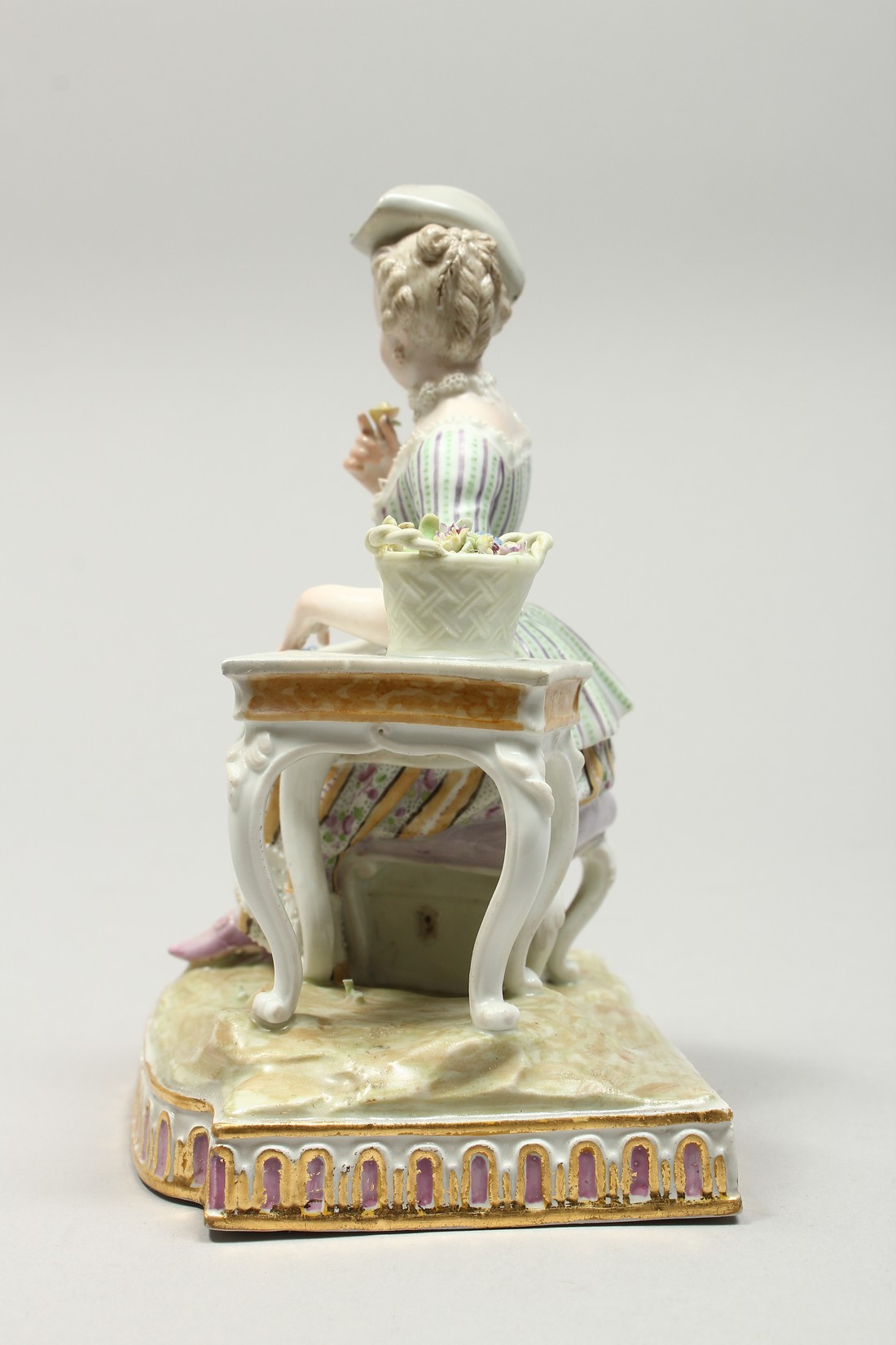 A GOOD MEISSEN PORCELAIN GROUP 'SENSE AND SMELL', a young lady sitting beside a table smelling - Image 3 of 13