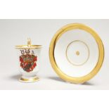 A BERLIN PORCELAIN CUP AND SAUCER, the cup with a crest. Blue septre mark.