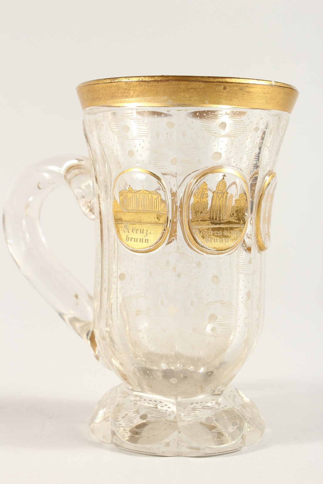 A GOOD BOHEMIAN GILT DECORATED GOBLET with handle, with a scene of buildings 4.75ins high. - Image 5 of 7