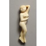 A CARVED BONE NUDE GIRL DOCTOR'S FIGURE 4ins long