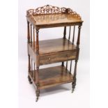 A LATE REGENCY ROSEWOOD TURNED TIER WHAT-NOT, the top with pierced fret work, centre drawer,