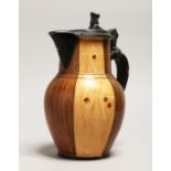 A CONTINENTAL FAUX BOIS WOOD GRAIN EWER with pewter lid. 9.5ins high
