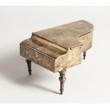 A NOVELTY SILVER PIANO JEWELLERY AND RING BOX, formed as a piano on tuned legs. London 1906. 7ins