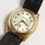 A HARWOOD GOLD WRISTWATCH with leather strap.