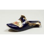 A GOOD MEISSEN PORCELAIN SLIPPER with rich blue ground edged in gilt and painted with an oval of