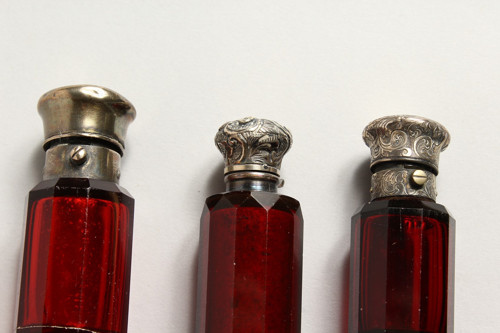 THREE VICTORIAN DOUBLE ENDED RUBY SCENT BOTTLE 3.5ins long - Image 2 of 5