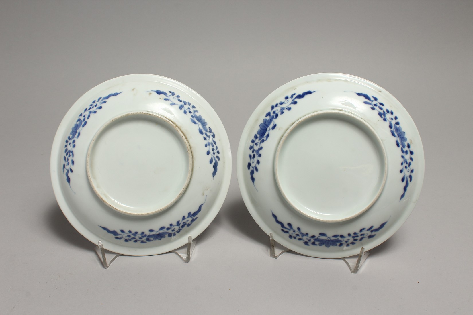 A PAIR OF BLUE AND WHITE PLATES decorated with storks. 7ins diamter. - Image 2 of 2