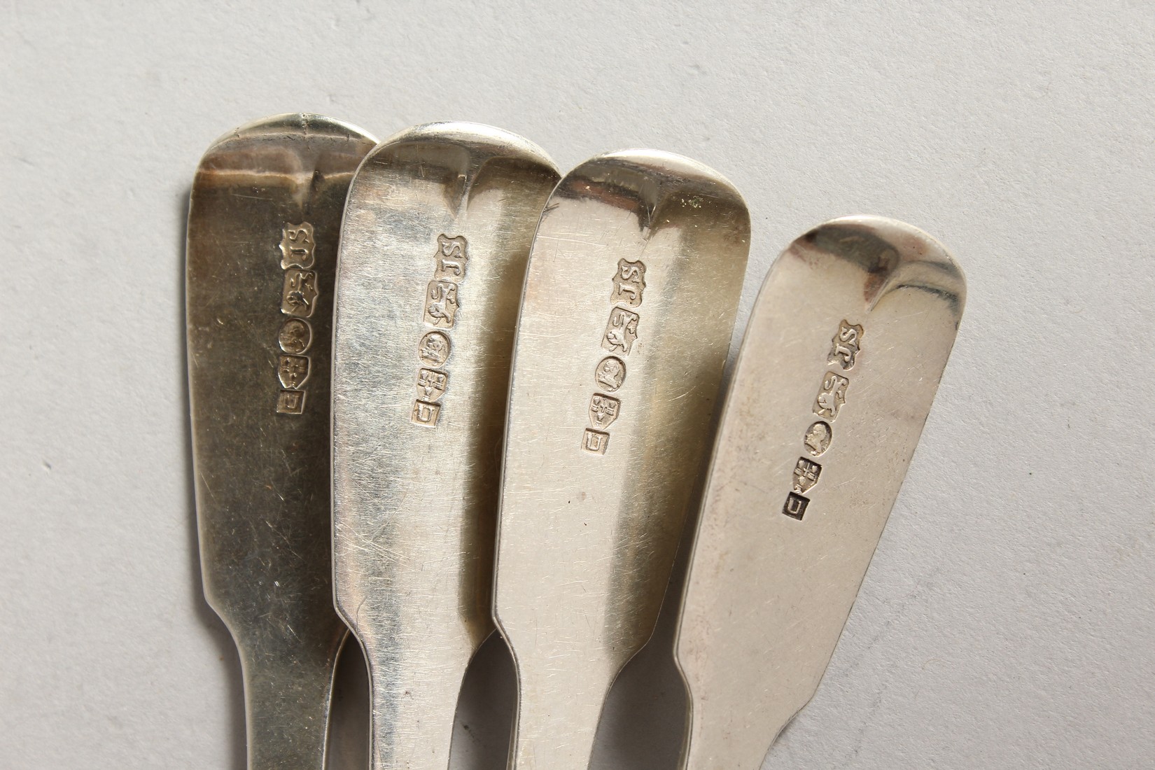 A SET OF FOUR WILLIAM IV SILVER FIDDLE PATTERN DESSERT SPOONS. Chester 1838, maker J.S. Weighs - Image 3 of 3