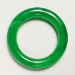 AN APPLE GREEN JADE BANGLE