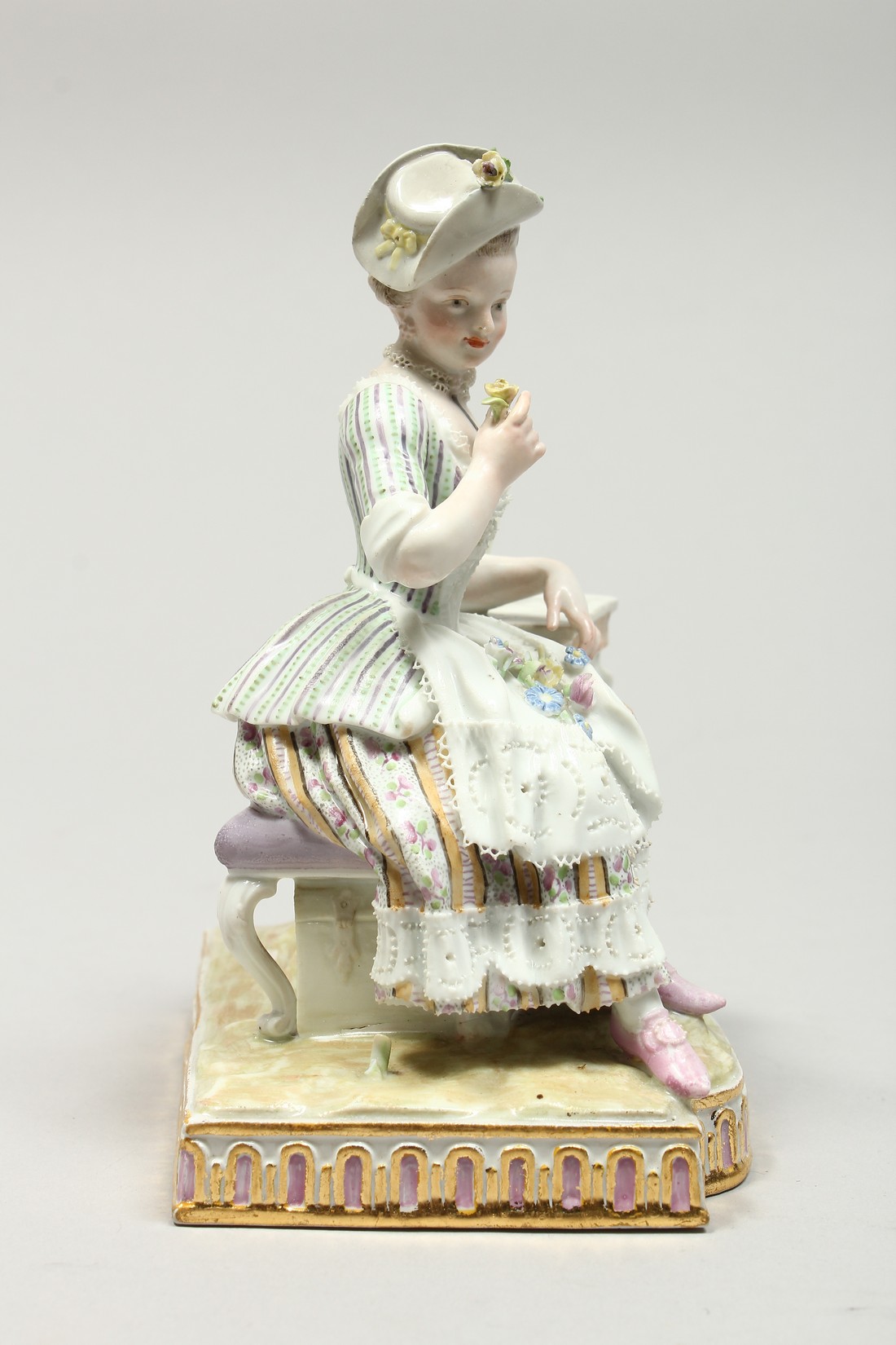 A GOOD MEISSEN PORCELAIN GROUP 'SENSE AND SMELL', a young lady sitting beside a table smelling - Image 5 of 13