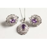 A SILVER AMETHYST NECKLACE AND EARINGS.