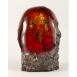 A LARGE RUSTIC PIECE OF AMBER 9.5ins high