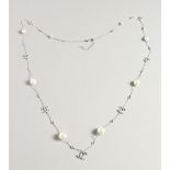 A PAIR OF SILVER AND PEARL NECKLACE.