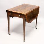 A GEORGE III MAHOGANY BUTTERFLY PEMBROKE TABLE with crossbanded top, shaped flaps, end drawer on