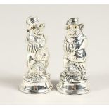 A PAIR OF SILVER PLATE FOX SALT AND PEPPERS