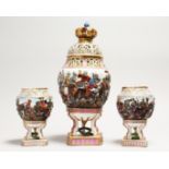 A CAPODIMONTE PORCELAIN PIERCED GARNITURE, large vase and cover and a pair of vases. 14 ins & 6.5ins