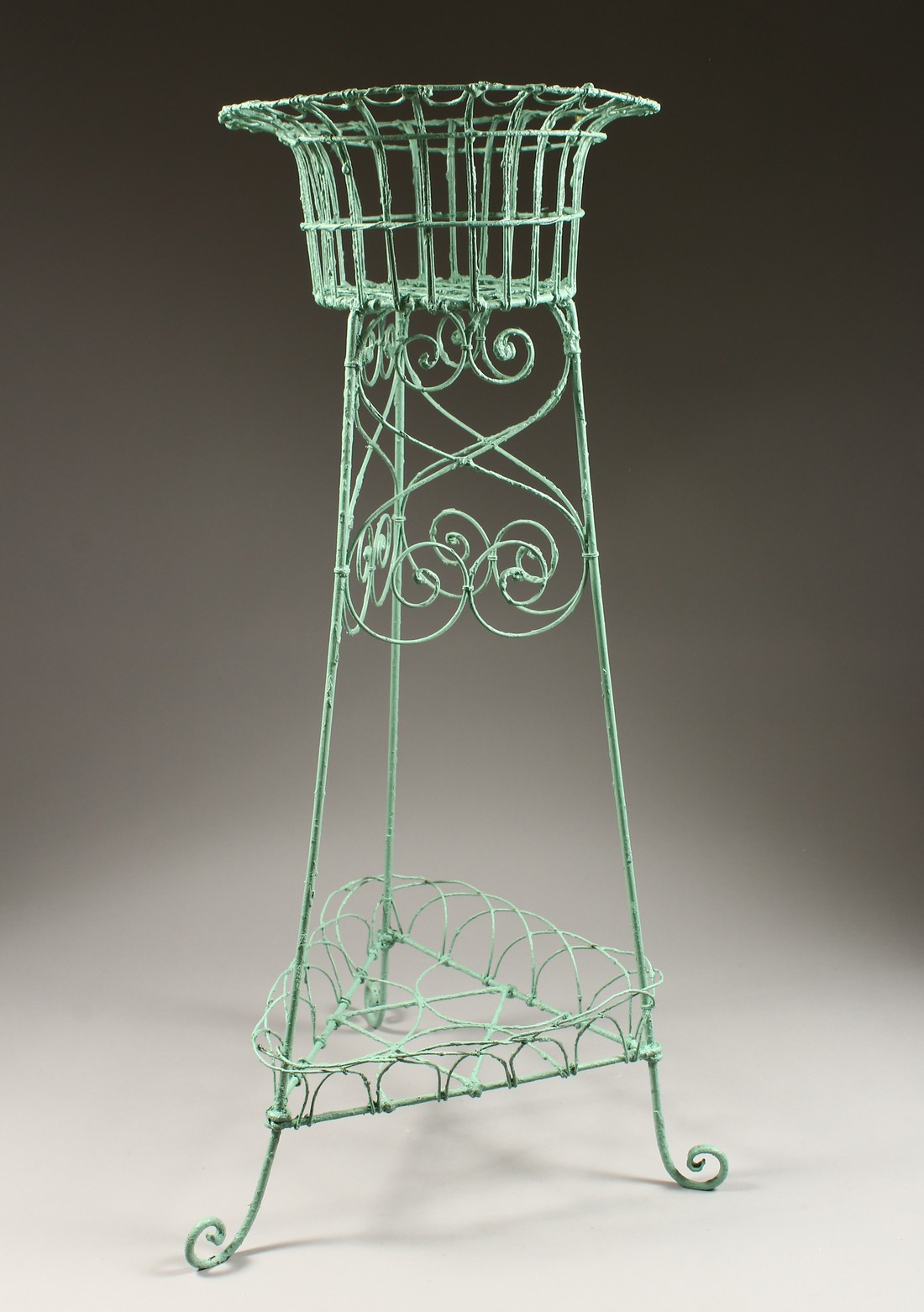 A WIREWORK PLANTER 34ins high