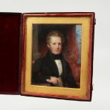 AN EARLY VICTORIAN PORTRAIT MINIATURE OF A YOUNG MAN, in a folding leather case. 4ins x 3ins.