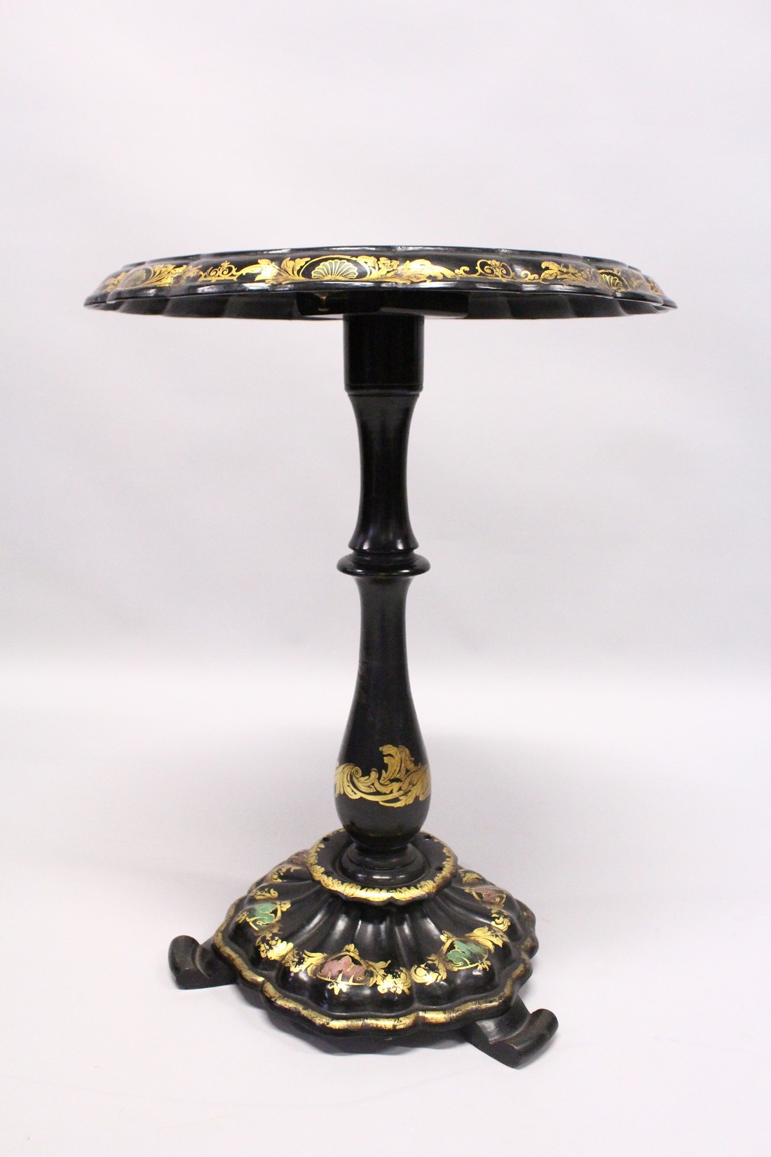 A VICTORIAN BLACK AND GILT PAPIER MACHE TILT TOP GAMES TABLE, with inlaid chess board in mother of - Image 5 of 5