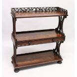 A GOOD LATE REGENCY ROSEWOOD THREE TIER WHAT-NOT, with pierced gallery, three shelves, the centre
