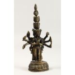 A TIBETIAN BRONZE MULTI HEAD GOLD FIGURE 7.5ins high