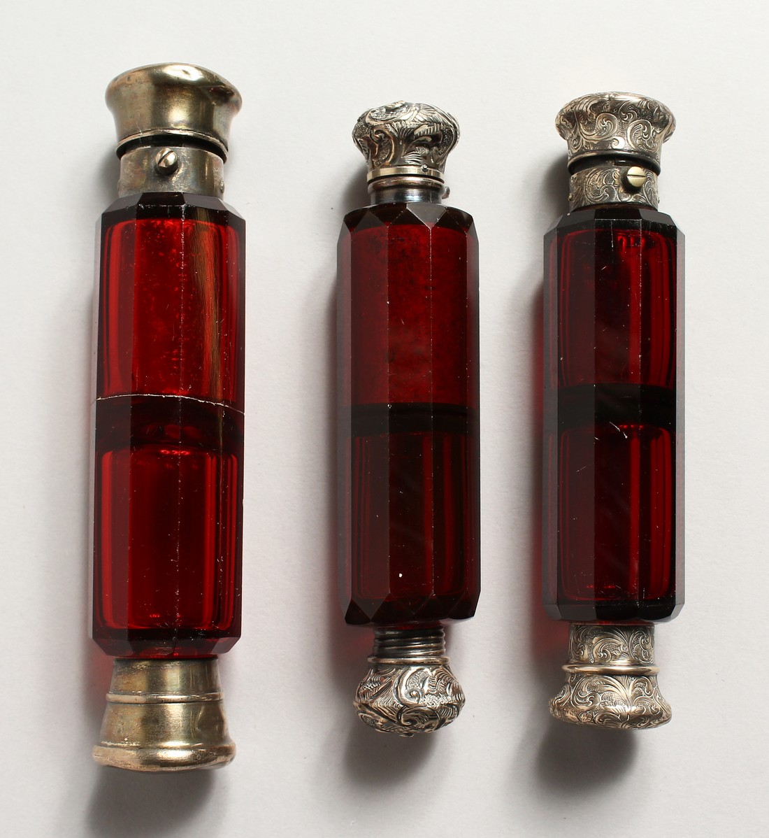 THREE VICTORIAN DOUBLE ENDED RUBY SCENT BOTTLE 3.5ins long