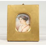 A GEORGIAN MINIATURE OF A FRENCH CLASSICAL HEAD AND SHOULDERS. 2.75ins x 2ins, in a gilt frame,