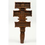 AN 18TH CENTURY GREEK CARVED WOODEN CROSS. 15ins long.