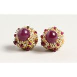 A SUPERB PAIR OF 18CT GOLD CARBOUCHON RUBY AND DIAMOND CLIP EARRINGS.