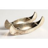 A PAIR OF SILVER CANOES. 7ins long Chester 1905