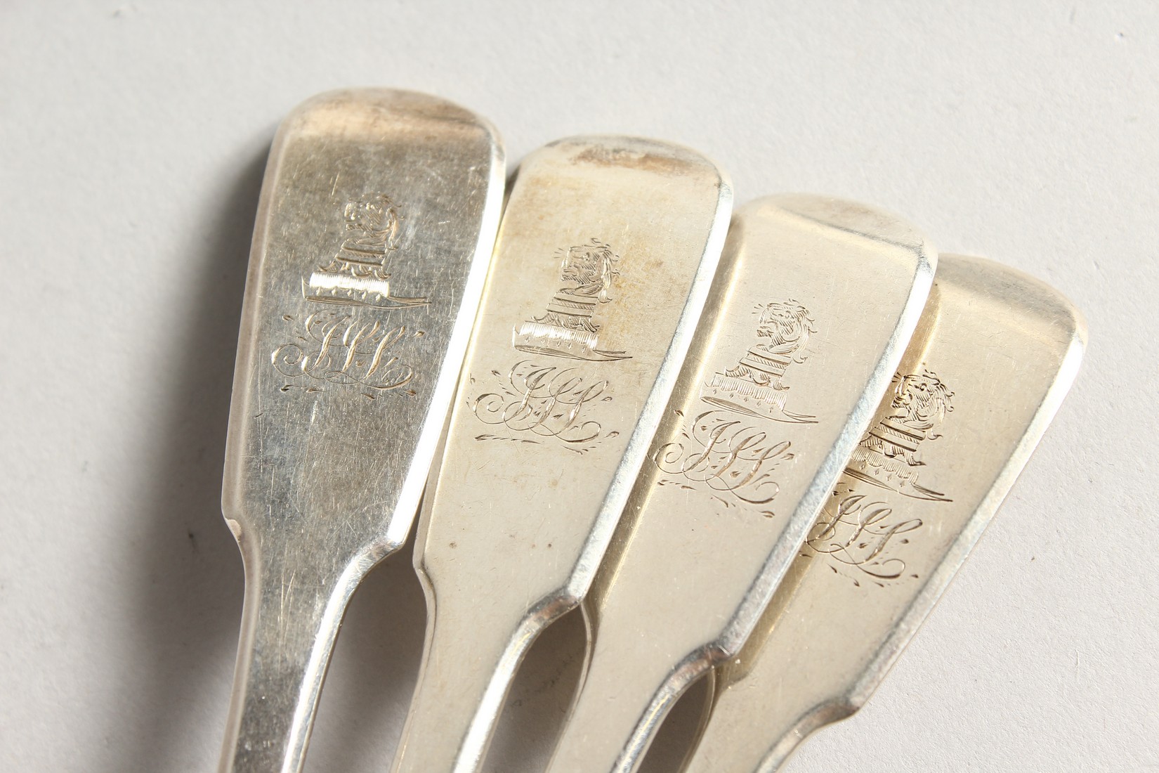 A SET OF FOUR WILLIAM IV SILVER FIDDLE PATTERN DESSERT SPOONS. Chester 1838, maker J.S. Weighs - Image 2 of 3