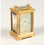 A SMALL BLUE SERVES DESIGN CARRIAGE CLOCK 2.5ins high