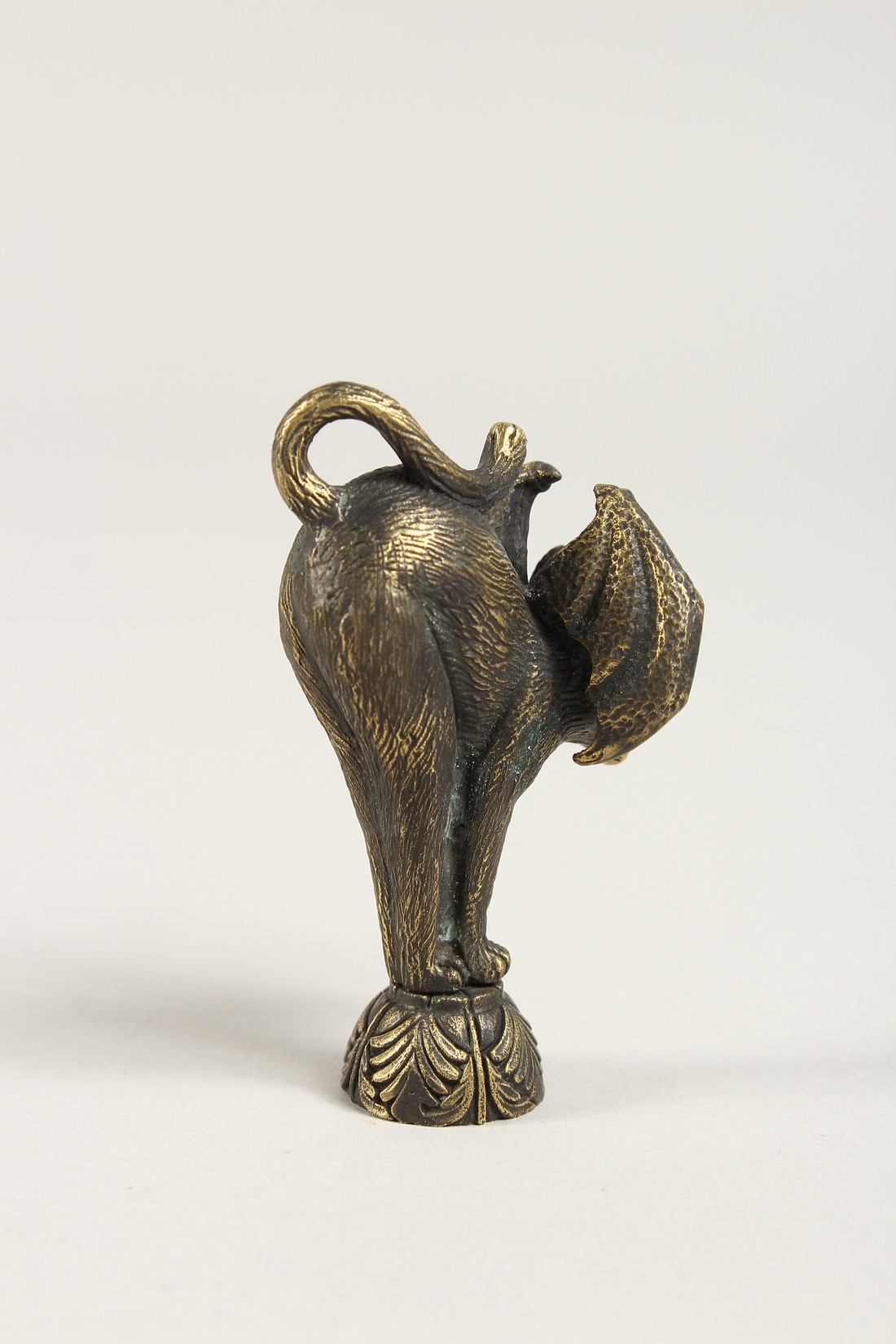 A BRONZE PIPE TAMPER as a cat snarling cat with bat's wings 2.5ins - Image 2 of 3