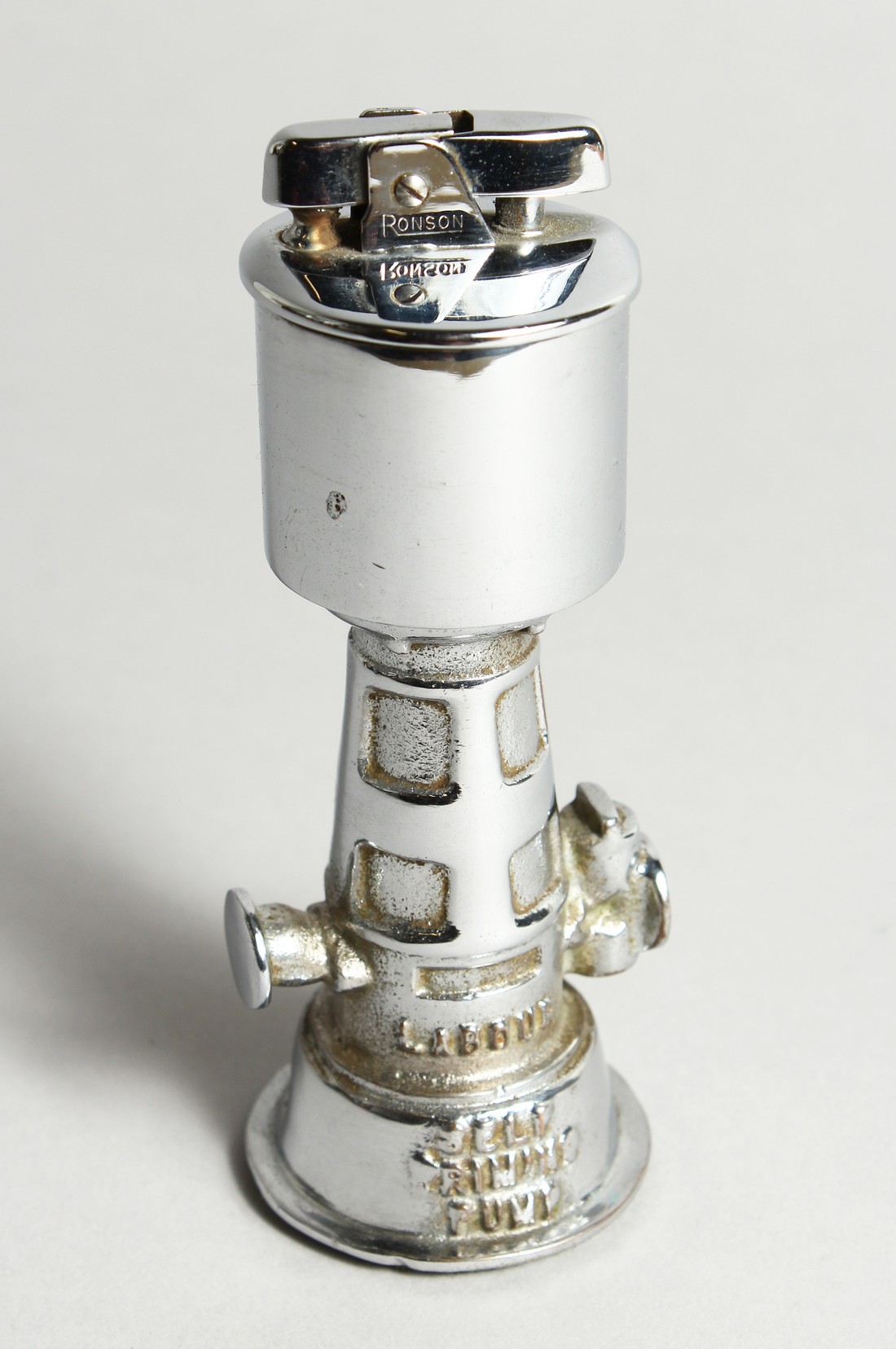 A RARE RONSON LIGHTHOUSE LIGHTER, stamped 'LABOUR' 5ins high.