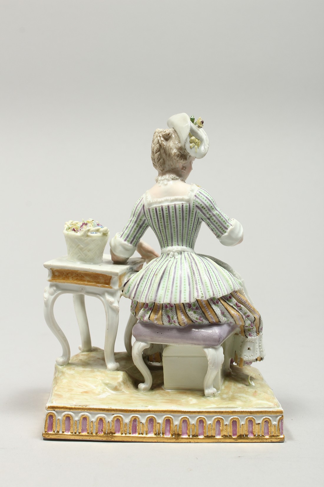 A GOOD MEISSEN PORCELAIN GROUP 'SENSE AND SMELL', a young lady sitting beside a table smelling - Image 4 of 13