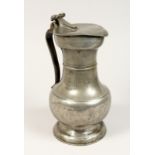 A SWISS PEWTER JUG 9.5ins high.