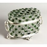 A CUT GLASS OVAL CASKET with ring handles