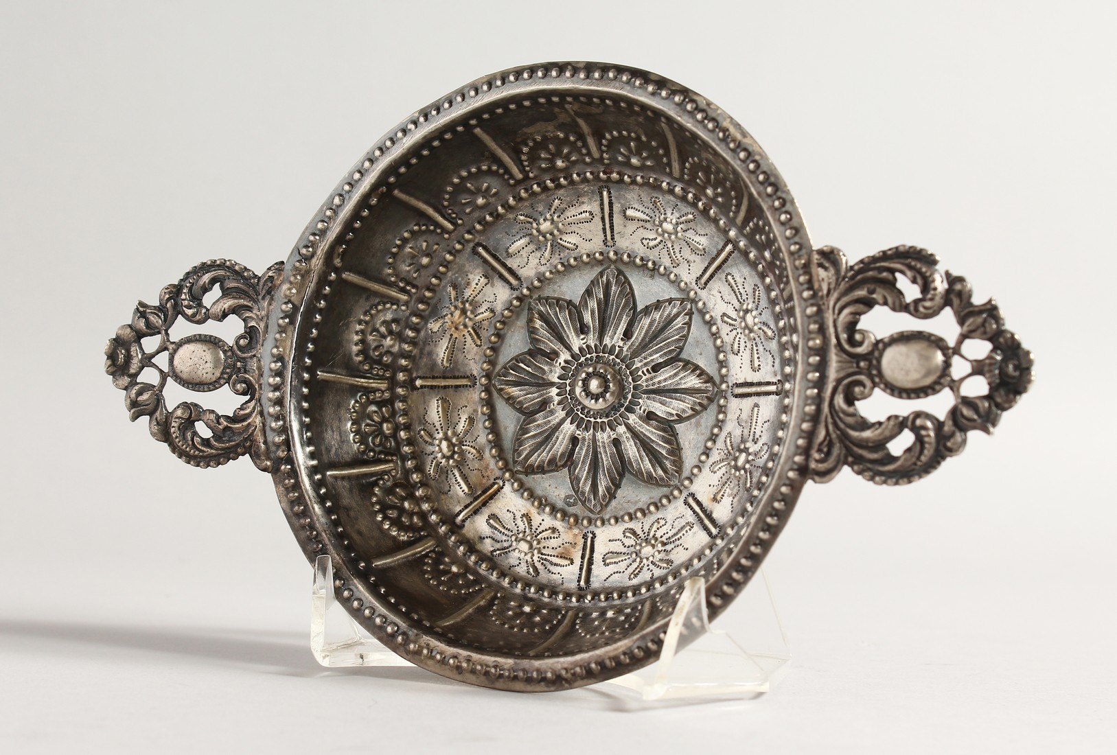 A CONTINENTAL SILVER TWO HANDLED BOWL 5ins diameter