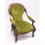 A VICTORIAN MAHOGANY SHAPED BACK ARMCHAIR, open arms, serpentine fronted seat on cabriole legs