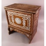 A MOTHER OF PEARL INLAID WOOD SMALL CUPBOARD, with a front drop panel door, 47cm high x 47cm wide