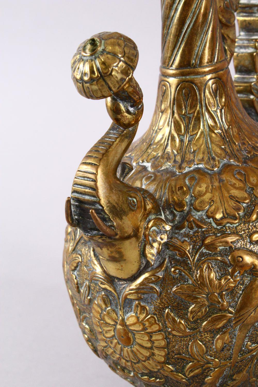 A 19TH CENTURY INDIAN SHIVA BRASS MOULDED EWER, with a stopper, the handle with an animal, the - Image 3 of 8