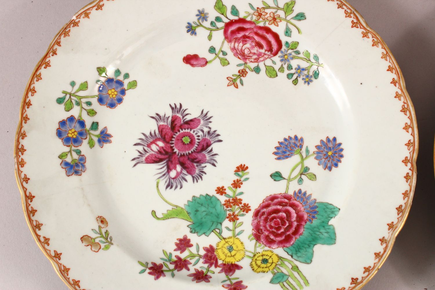 FOUR CHINESE 18TH CENTURY FAMILLE ROSE PORCELAIN PLATES, each with varying floral decoration, 23cm - Image 5 of 6