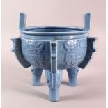 AN UNUSUAL CHINESE CELADON GLAZED BLUE PORCELAIN CENSER, with twin handles, body with archaic